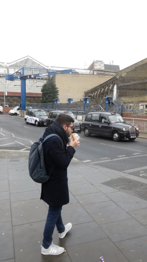 Man eating in street