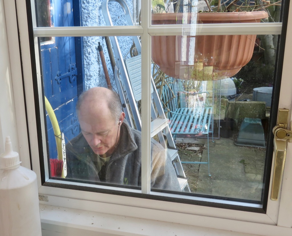 Richard plumbing (through the window)